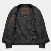 Genuine distressed cowhide leather offers a timeless vintage appearance. Ergonomic action back design ensures total comfort during long rides. Classic racing patches provide an authentic and heritage-inspired look. Functional zippered pockets and armor-ready lining enhance rider utility.